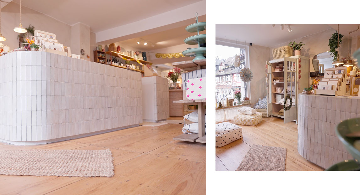 Die Wand hinter der Theke in der SCHÖNER WOHNEN-Farbe Trendfarbe "Macchiato" und "Ahoi".